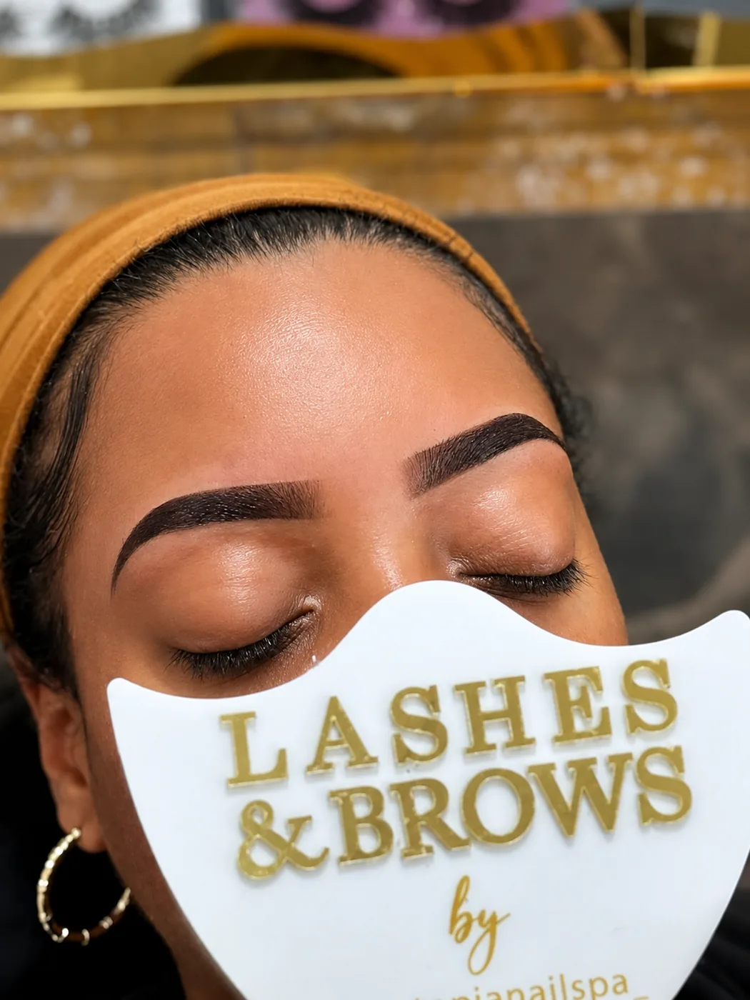 Close-up of defined brows and lashes following a lash and brow appointment