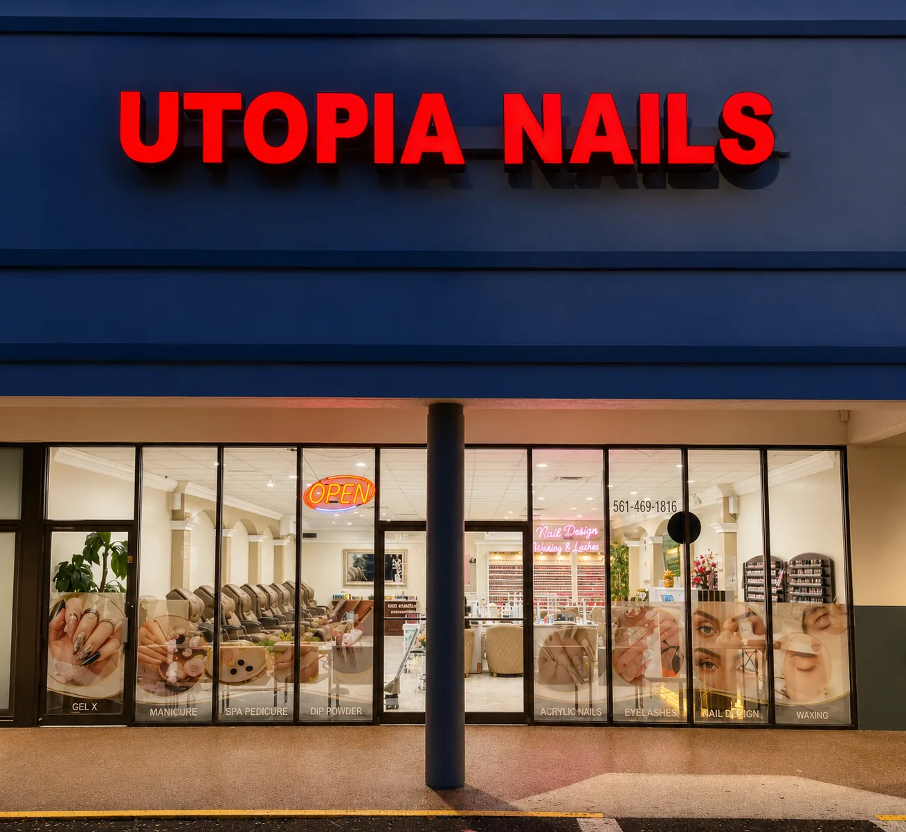 Illuminated Utopia Nails storefront sign above the glass entrance at 610 Belvedere Road